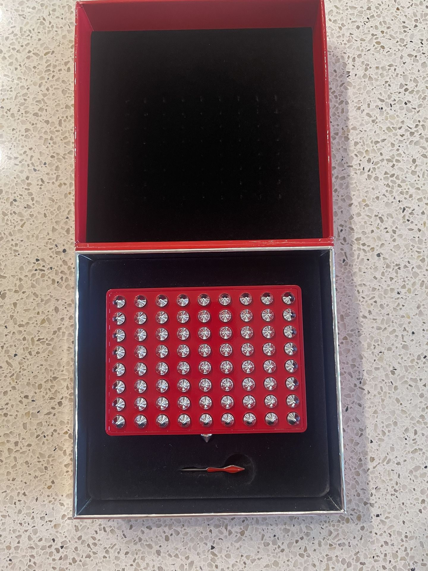 Christian Loubuton Red Studd Case 