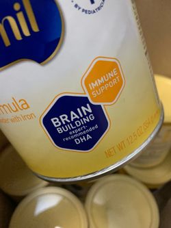 7 SMALL YELLOW CANS OF ENFAMIL