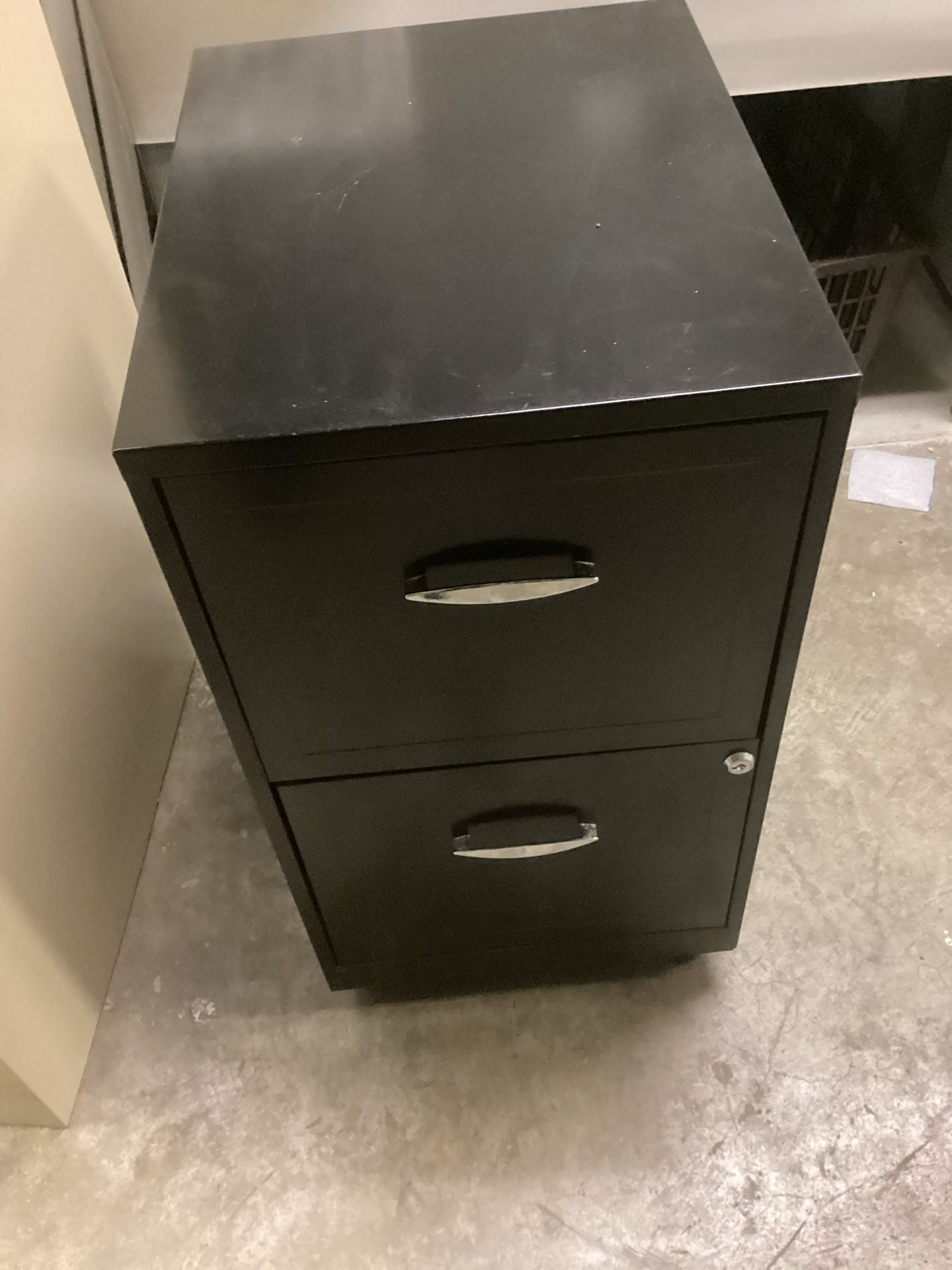 2 drawer file cabinet with hanging files.