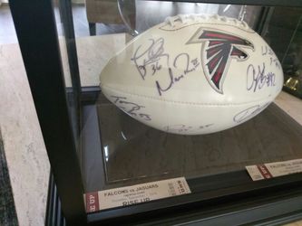 Authentic signed Matt Ryan and 7 team player's in glass display case with JSA certificate of authenticity