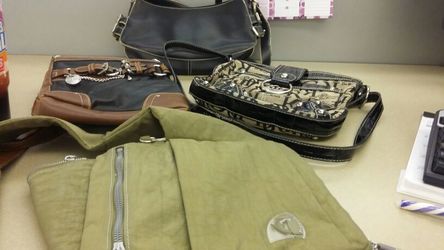Lot of purses and a bag