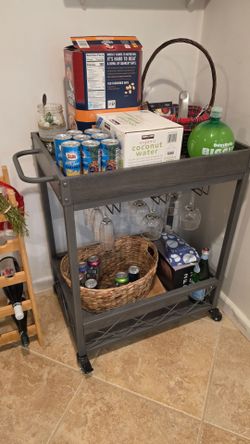 Rustic bar cart on wheels