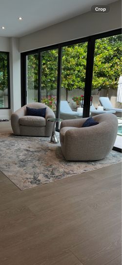Pair of Gray Boucle Barrel Accent Chairs rotating great condition