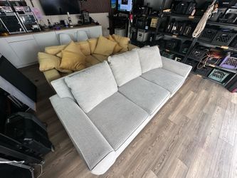 Two amazing couches. Spent thousands on each.  400 each.