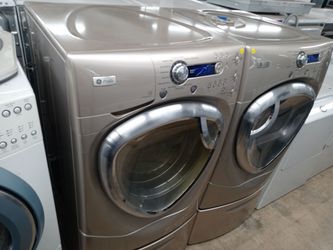 GE Profile tan front load washer and dryer set on pedestals - Free delivery