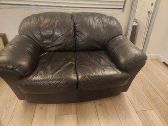 Black Genuine Leather Loveseat.