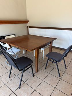 Table and with mixed match chairs