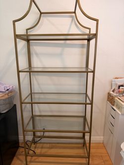 Gold Metal and Glass Shelf