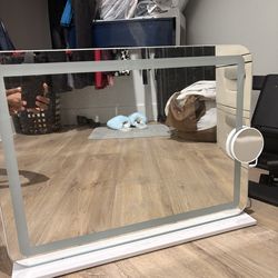 Stand alone vanity mirror with lights