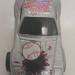  1989 Hot Wheels Silver Baseball Porsche 930 Home Run diecast car. 