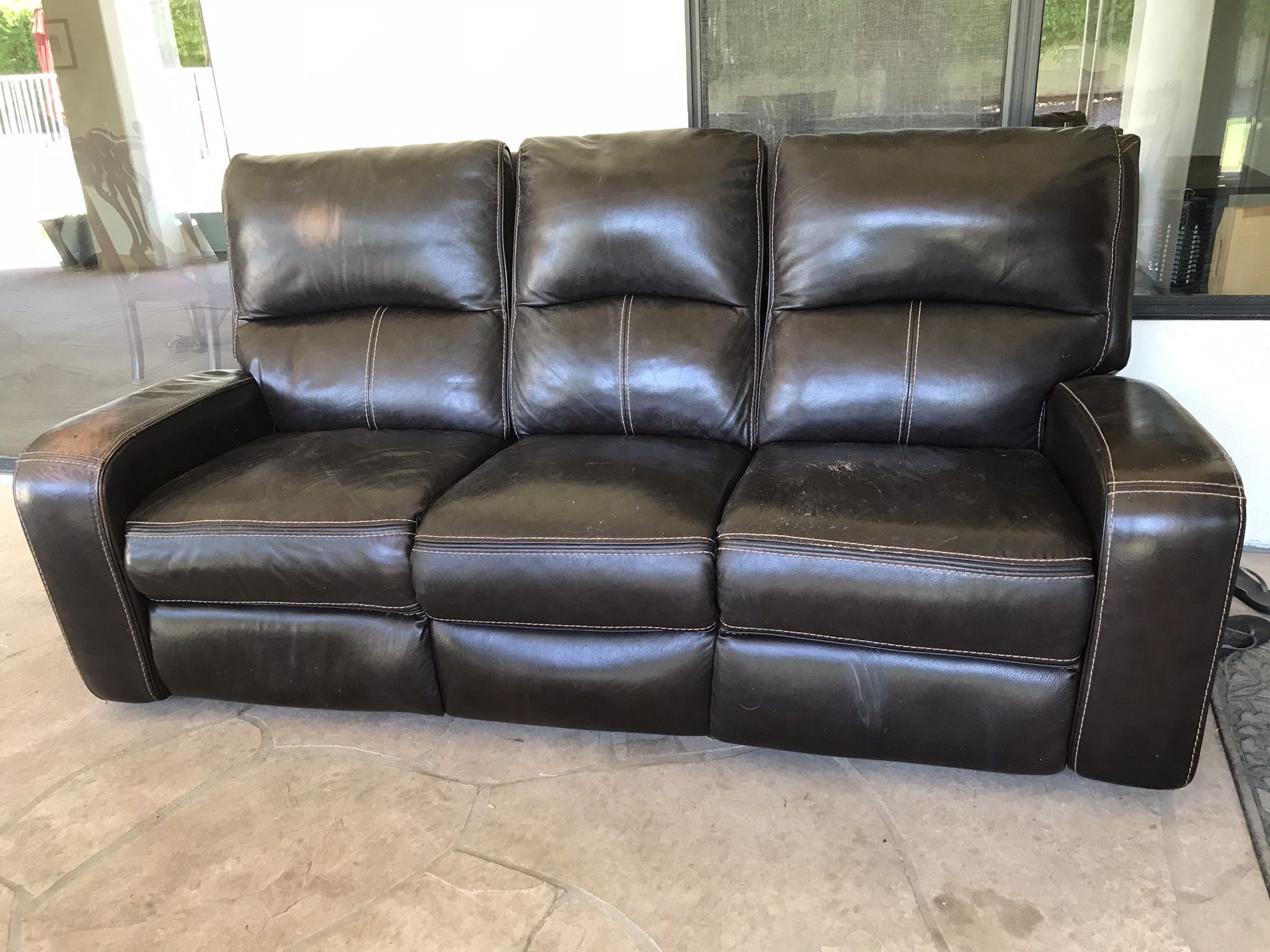 3 Seat Couch With Two Of The Seats Being Recliners