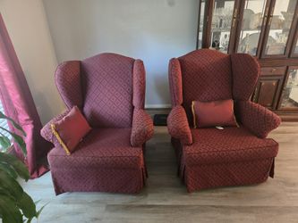 2 vintage comfortable high back chairs gently used. Burgundy in color