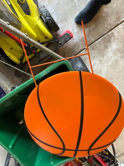 Orange Basketball  sign with ground spikes