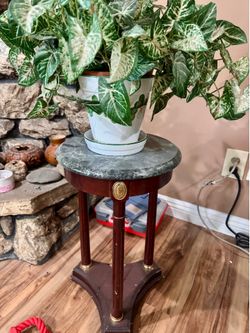 Bombay Neoclassical side table w/ marble top + fake plant.