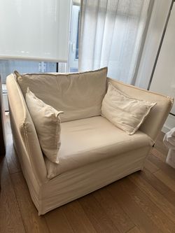 IKEA BACKSÄLEN 1.5-seat armchair in white.