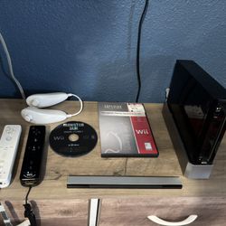 Nintendo Wii With 2 Controllers 2 Nunchucks 