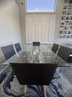 Modern glass dining table and chairs