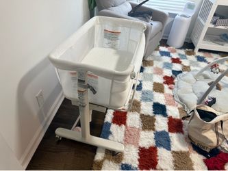 VaVaSoo remote control musical rocking bassinet life saver