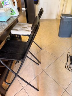 3 brown bar stools / dining chairs  with removable cushions