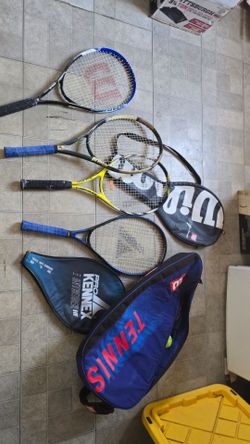 4 tennis rackets and bags