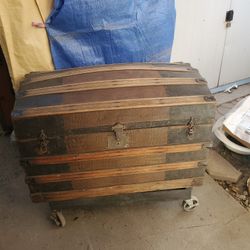  antique camelback  steamer trunk,  dating from the late 19th or early 20th century. 