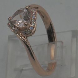 10kt rose gold ring 2.5 gr w 18 small diamonds & pink heart shaped CZ size 7.25. 878899-1
