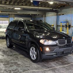 2009  BMW  X5   $7,000