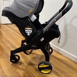 Doona Stroller  & Base And Storage Bag Bundle 