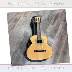 Acoustic Guitar Amazing Sound and Classic Design she minute