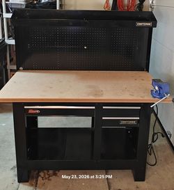 Like New CRAFTSMAN Work Bench with Drawers, shelves, Bench Vise Ductile Cast Iron & power strip in great condition.
L54"*W23"*H62"