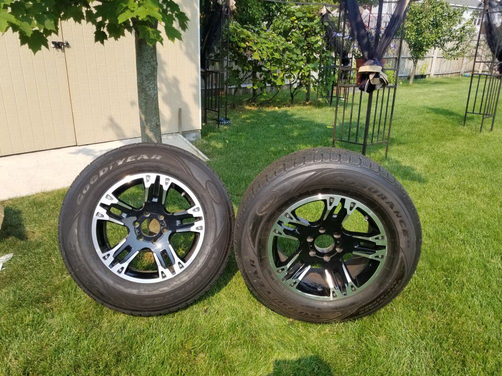 Black aluminum 18" rims with tires
