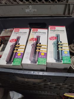 Three Toro Single Stream Lawn Sprinkler