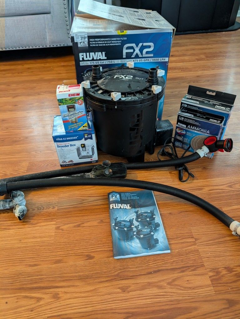 Fluval Fx2 used in good condition with box and extra accessories.