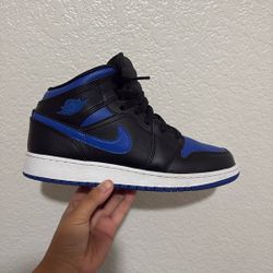 blue and black nike air jordan’s 