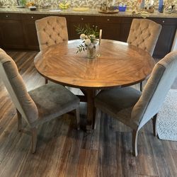 Round Wood Dinning Table With 4 Tufted Chairs 