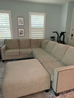 Living Spaces Sectional Sofa with Ottoman
