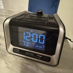 Digital alarm clock with LED projection