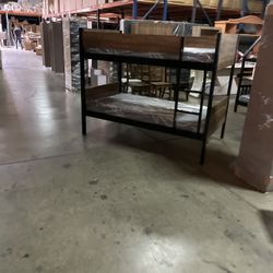 Twin bunk bed. Available in espresso, white, & grey. Bunk bed only-$220. With mattresses-$399. Assembly required. Assembly not included. Tax included.