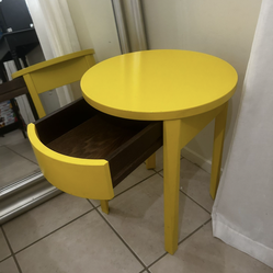 IKEA yellow bedside round table