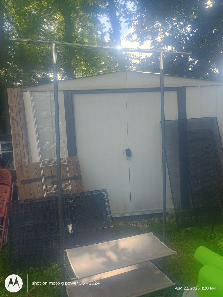 Metal Rack To Hang Clothes On With 2 Shelves On The Bottom For Shoes With Wheels