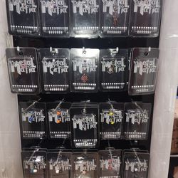 Metal mafia Display Case And 40 Pieces Of Piercing Jewelry 