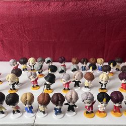 Tiny tan BTS toys