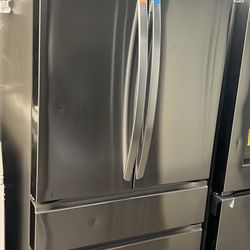 New Open Box Lg Four Door Stainless Steel Refrigerator With Internal Water/Ice