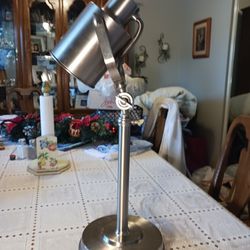  REALLY NEAT LOOKING  STAINLESS STEEL  LAMP WITH  3 ADJUSTMENT  FOR LIGHTING 