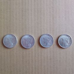 4 Peace Silver Dollars