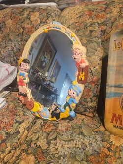 PINOCCHIO AND FRIENDS VINTAGE 1960 OVAL MIRROR IN GOOD ORIGINAL CONDITION $60.00 FIRM PRICE. 