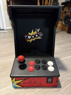 The iCade is an accessory for the Apple iPad line of devices which functions as a miniaturised, portable arcade cabinet, including a physical joystick
