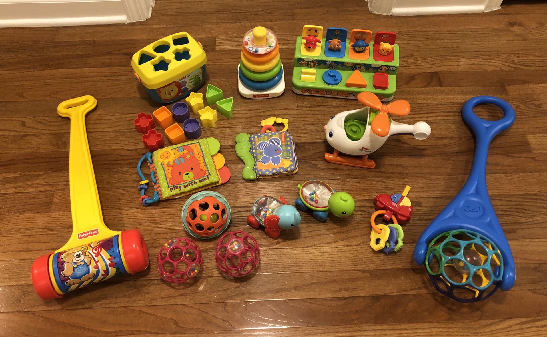 14 PCs Baby Toddler Kids Toys includes Push Toys, Shape Sorter, Ring Stacker, Pop-up Toys, Balls, Push Animal Cars, Etc. Take All For $25 Price Is Fir