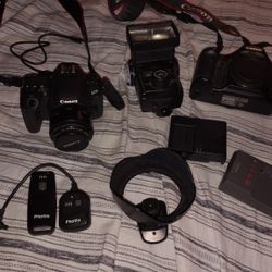 Two Cannon Cameras Top Of The Line 