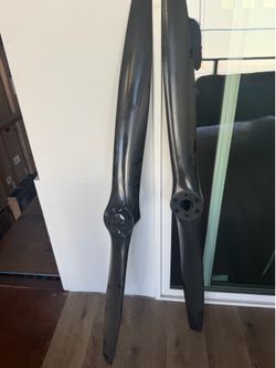 Two painted airplane propellers
